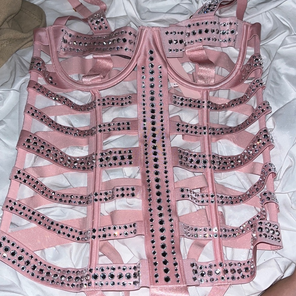 It’s lingerie from Victoria Secrets. The color is pink and it is brand new.